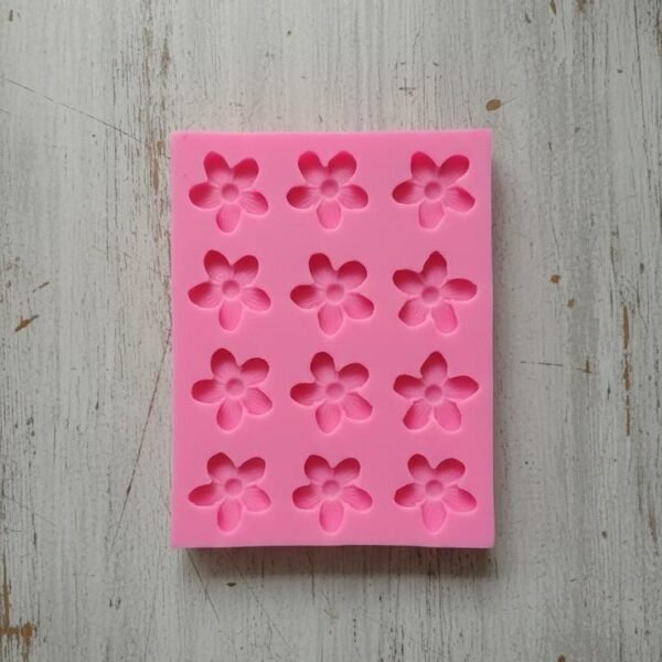 Pink 12 cavity flower size 13*10*0.9146 grm